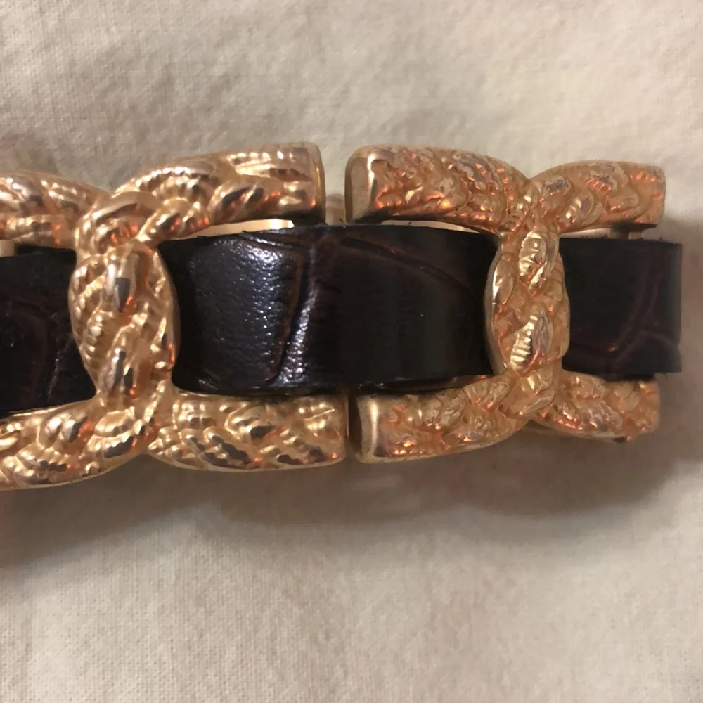 Gold and brown belt 35 inches to first hole. Size M